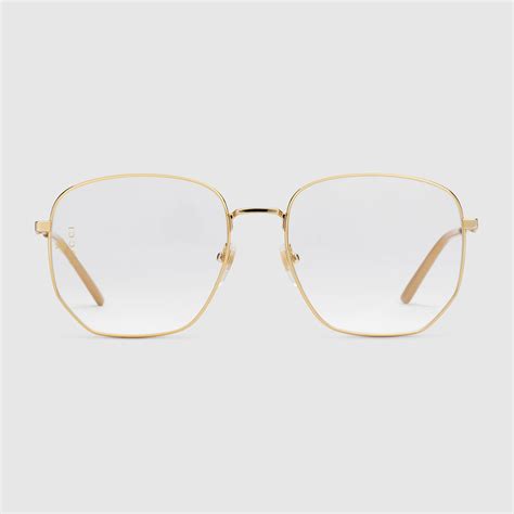 Gucci gold rimmed glasses